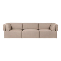 Beige three-seater sofa with soft fabric and subtle texture, featuring rounded armrests for a modern look.