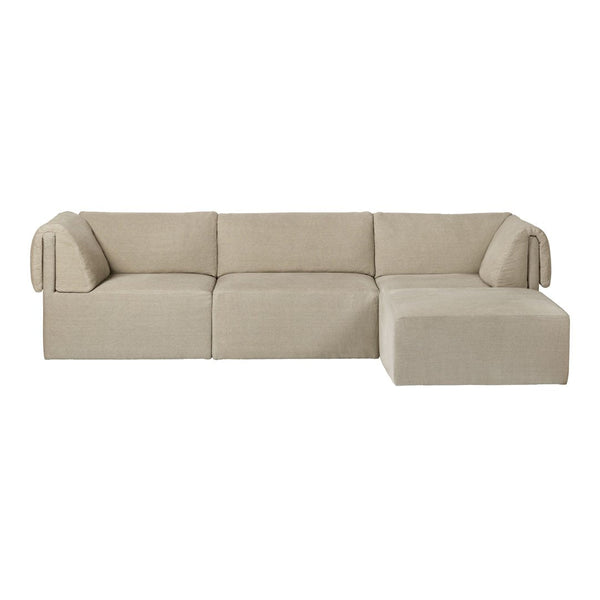 Light beige modular sofa with simple, modern design and plush fabric upholstery. Ideal for contemporary living spaces.