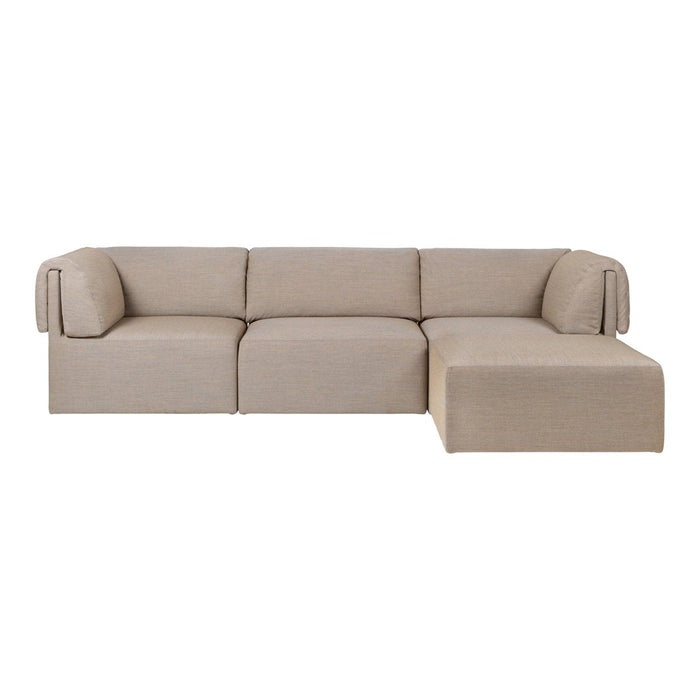 Beige sectional sofa with a textured fabric and minimalist design. Cozy and modern, perfect for any living space.
