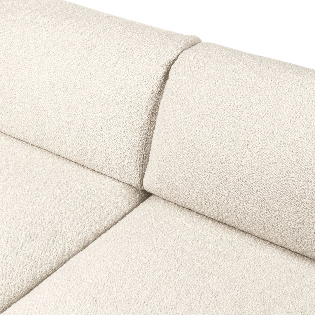 Light beige textured fabric with a soft, cozy feel, featuring a smooth, seamless design. Ideal for modern decor.