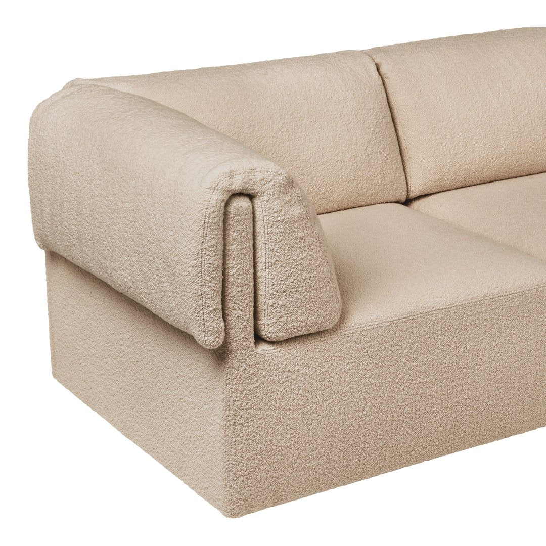 Beige textured sofa with a cozy, soft boucle fabric and minimalist design, perfect for modern interiors.