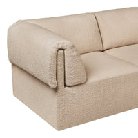 Beige textured sofa with a cozy, soft boucle fabric and minimalist design, perfect for modern interiors.