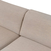 Beige textured fabric with subtle patterns, perfect for contemporary home decor.