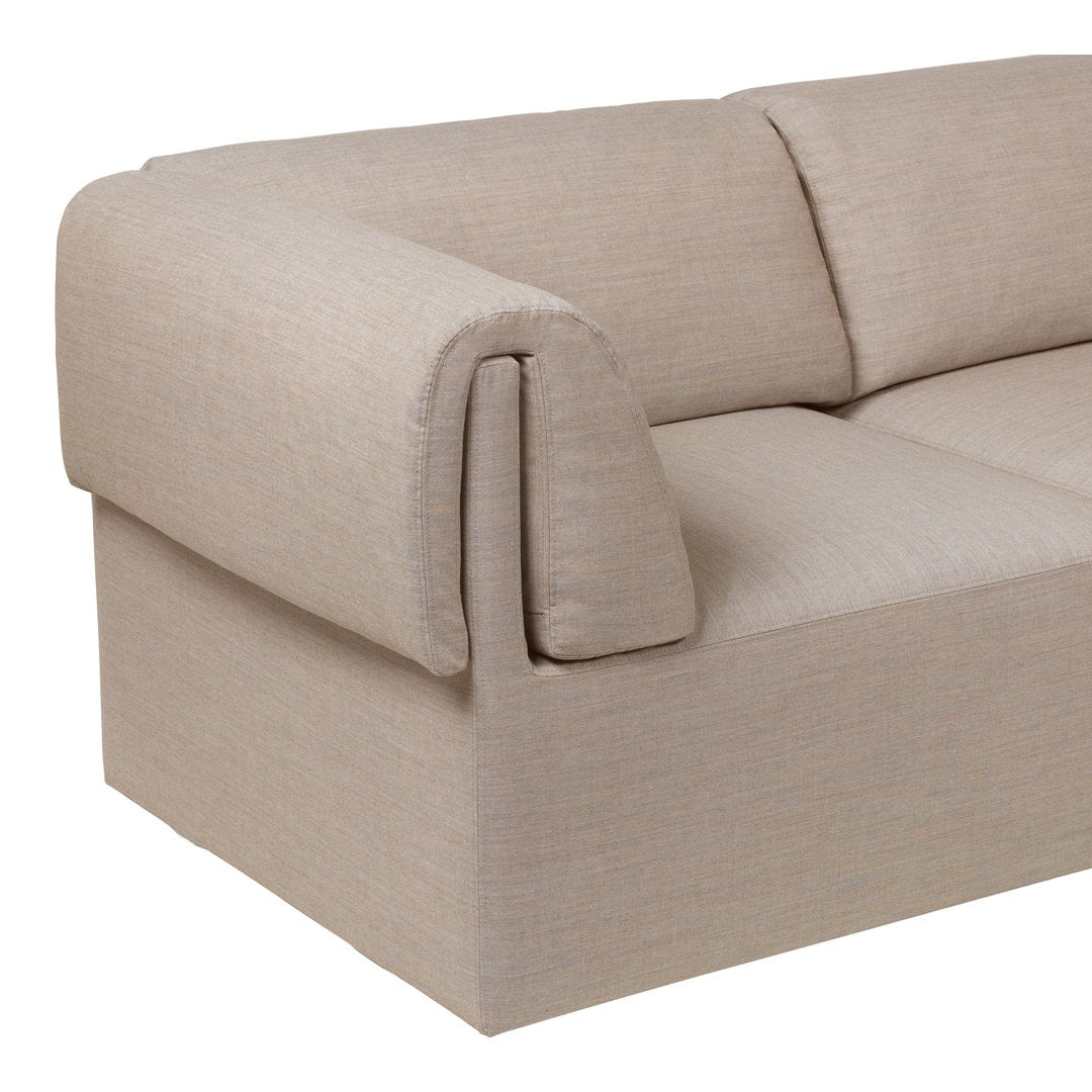 Beige fabric sofa with a smooth texture and subtle woven pattern, ideal for modern living spaces.