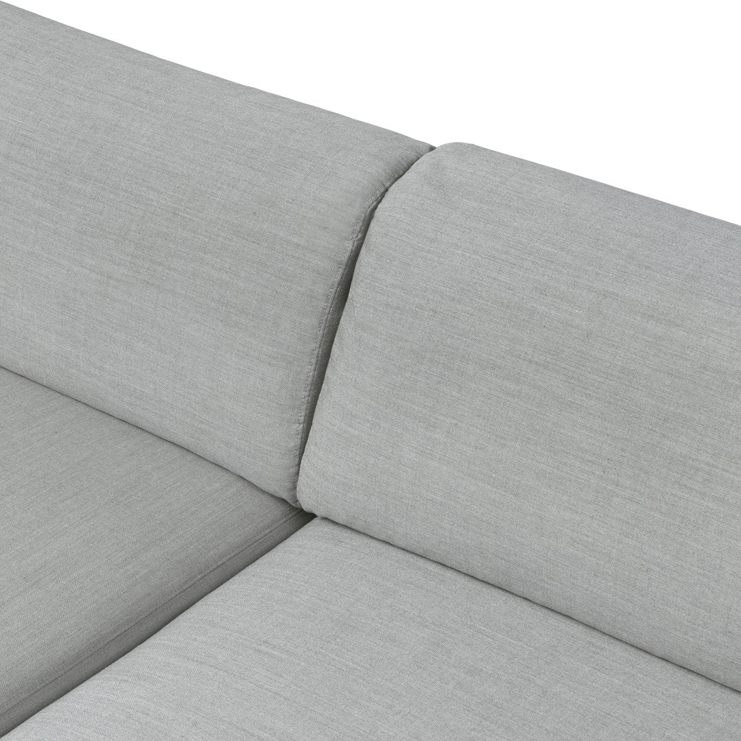 Light gray sofa upholstery with a smooth, textured fabric and minimalist design, perfect for modern interiors.