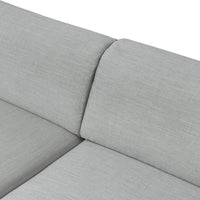 Light gray sofa upholstery with a smooth, textured fabric and minimalist design, perfect for modern interiors.