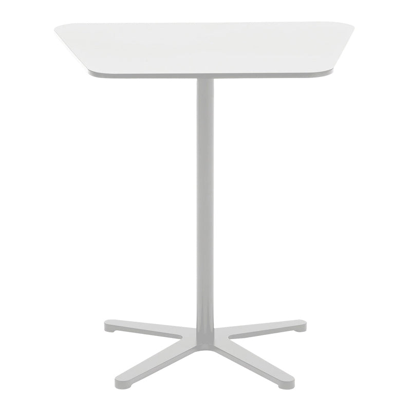 White dining table with a sleek, minimalist design and a light gray base, featuring smooth, clean lines.