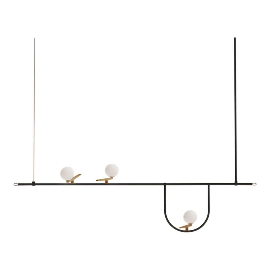 Modern black linear light fixture with three white globe bulbs and gold accents, featuring a sleek minimalist design.