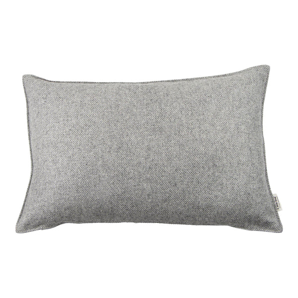 Gray textured rectangle pillow with a soft, woven finish. Perfect for cozy home decor accents.