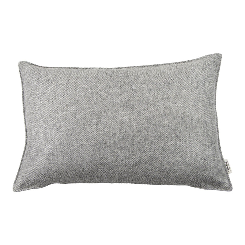 Gray textured rectangle pillow with a soft, woven finish. Perfect for cozy home decor accents.
