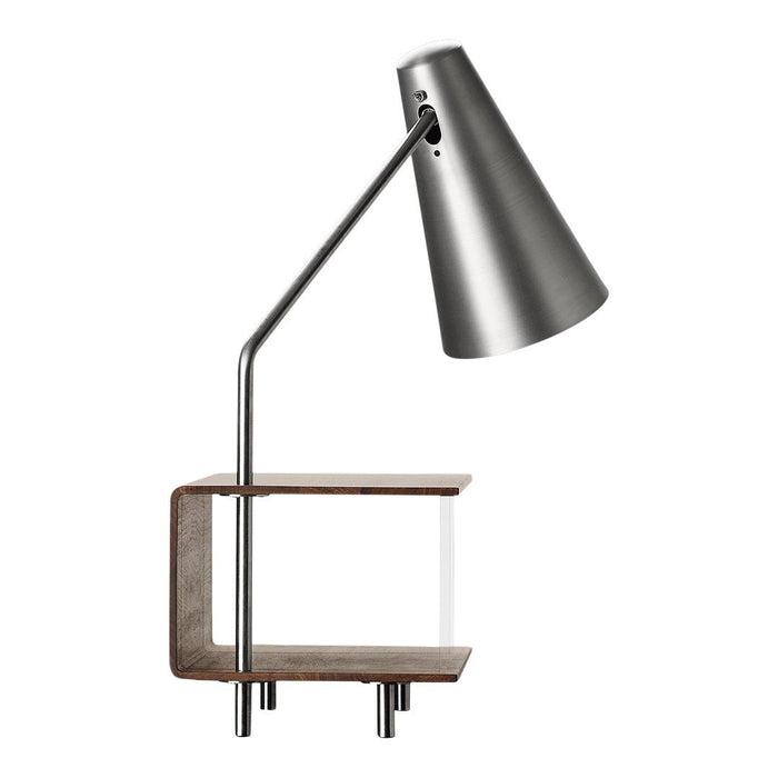 Modern desk lamp with a sleek silver metallic shade and a minimalist brown wood base. Ideal for contemporary decor.