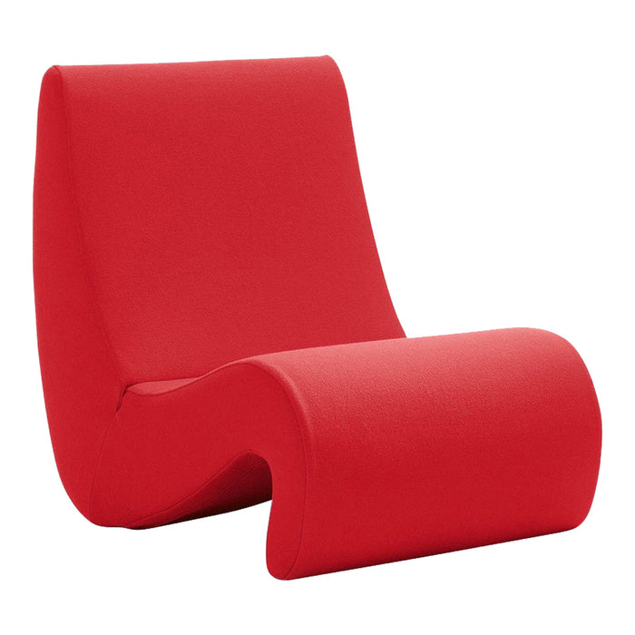 "Vibrant red lounge chair with smooth, curved design and solid color upholstery."