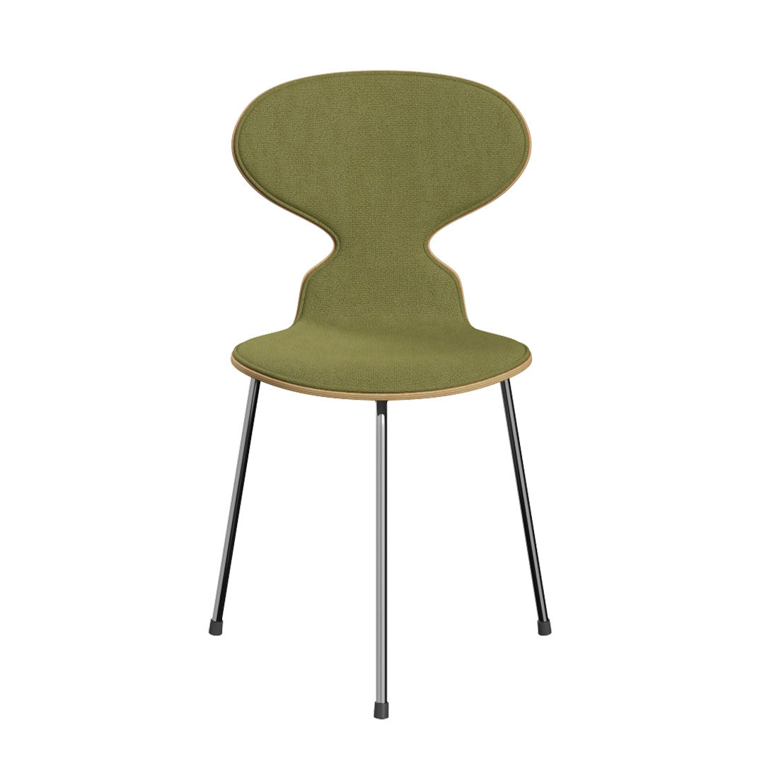 Green upholstered chair with a unique silhouette and black metal legs, featuring a smooth, minimalist design.