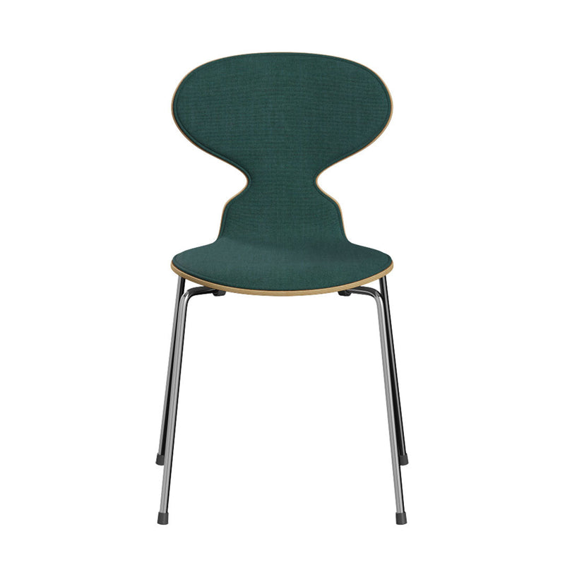 Green upholstered chair with a distinctive curved shape and wooden accents, set on sleek metal legs.