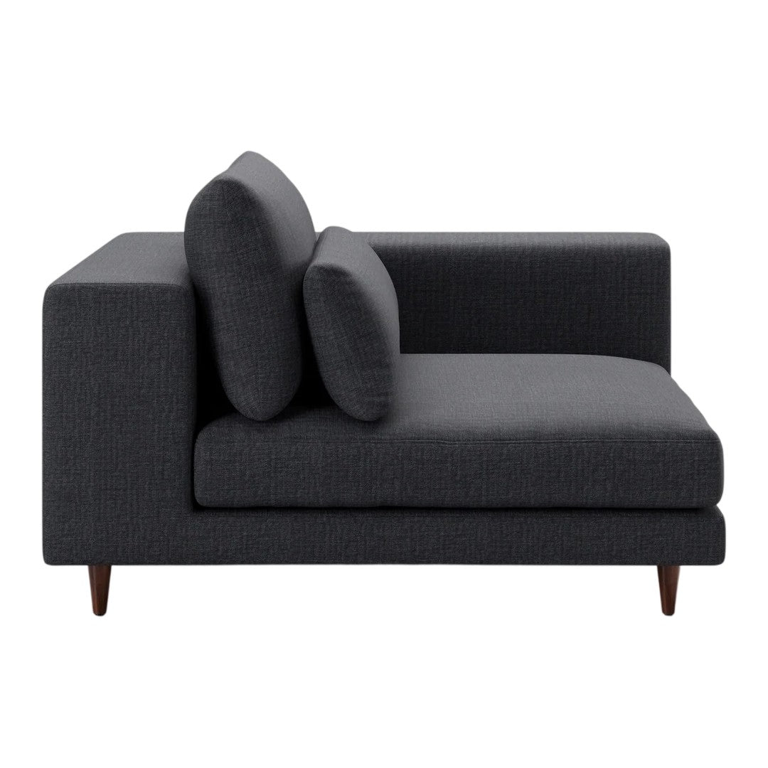 Stylish dark charcoal gray sectional sofa with smooth fabric and rounded cushions, elevate modern home decor.