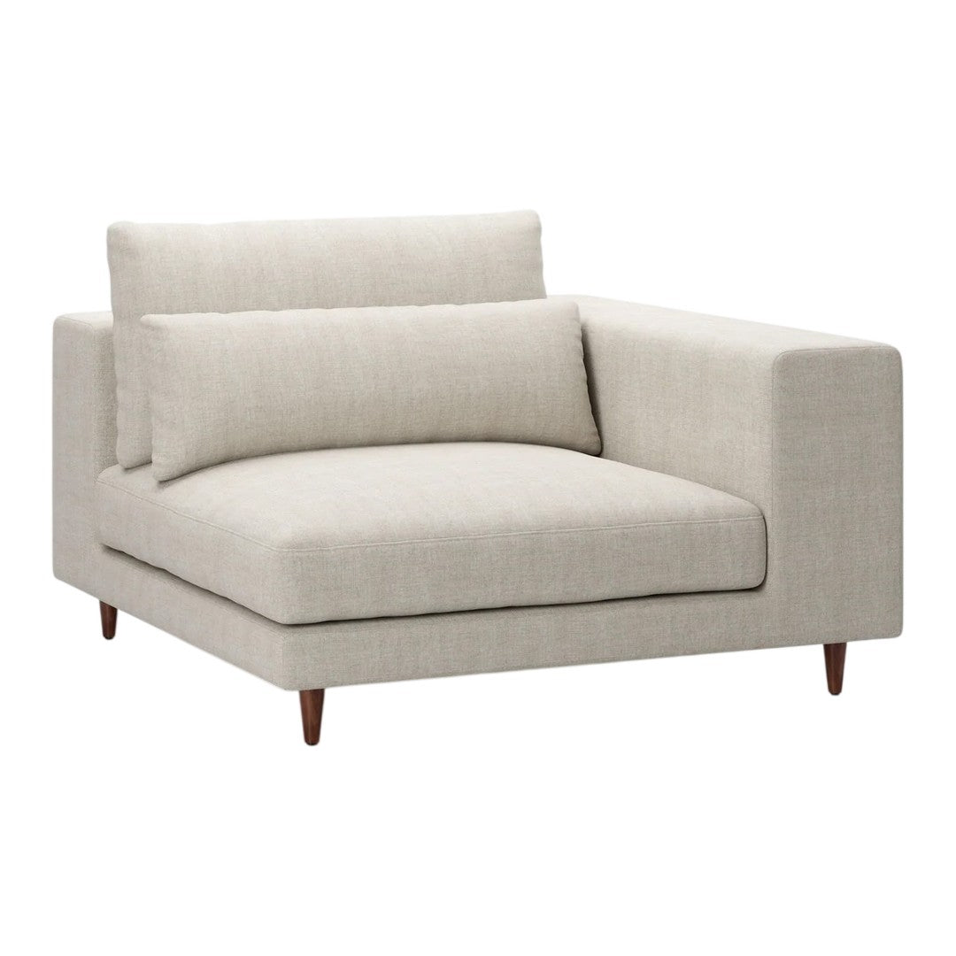 Light beige modern sectional sofa with clean lines and minimalistic design, featuring smooth fabric and wooden legs.