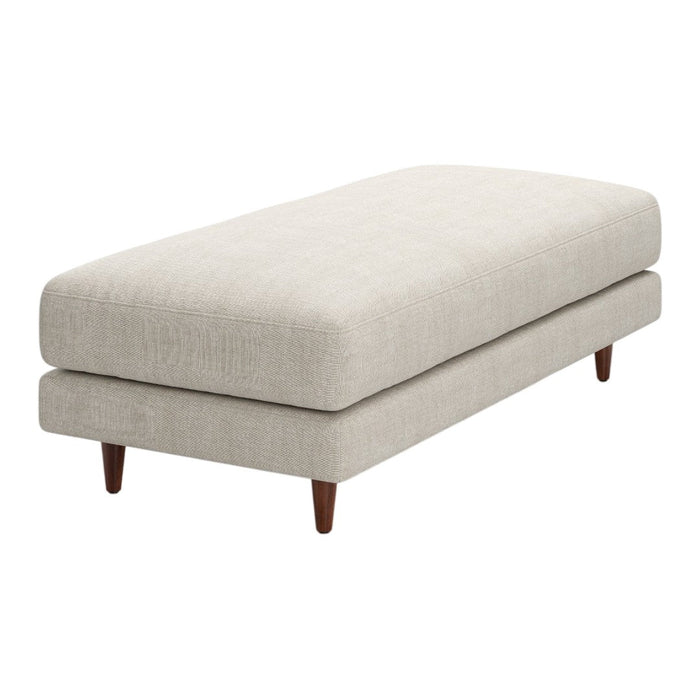 Neutral beige upholstered ottoman with a smooth texture and minimalist design, featuring tapered wooden legs.