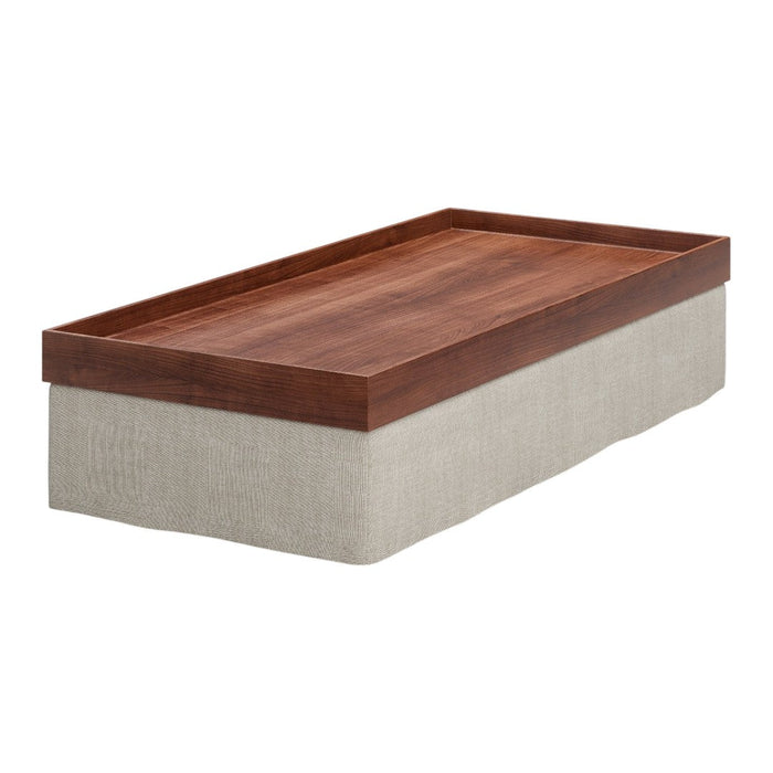 Rectangular coffee table with a rich brown wooden top and neutral beige fabric base. Modern and stylish design.