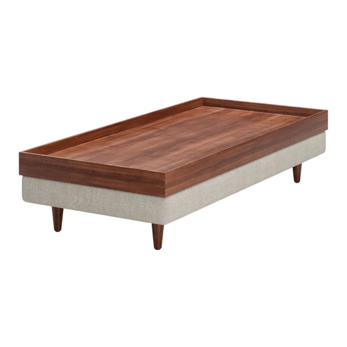 Wooden coffee table with a rich, walnut finish and a light, textured fabric base. Simple, modern design.