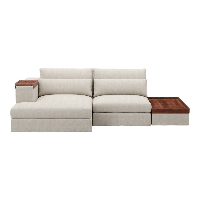 Light beige upholstered sectional sofa with smooth texture and rich brown wood accent. Elegant and modern design.