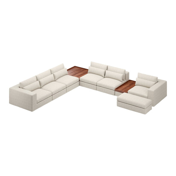 Modern L-shaped sofa in soft cream upholstery with a rich wooden accent table, ideal for stylish living spaces.