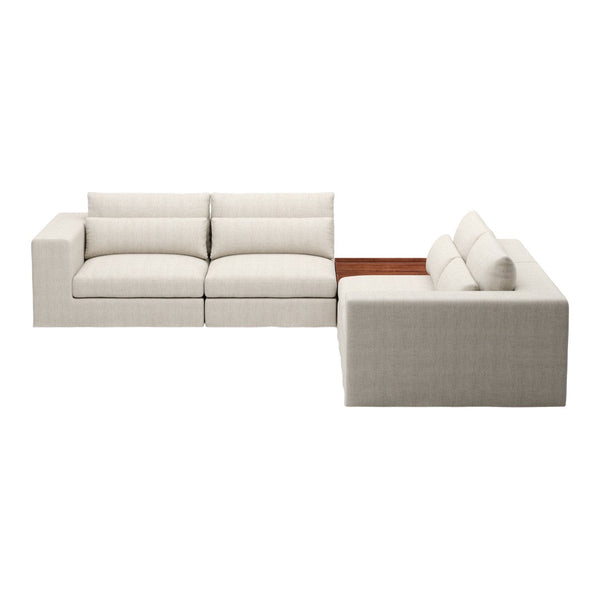 Light beige sectional sofa with subtle textured pattern and wooden accent table, ideal for modern living spaces.