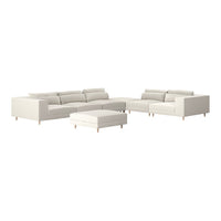 Modern white sectional sofa with clean lines and minimalist design, featuring light wood legs.