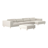 Light beige sectional sofa with clean lines and a minimalist design, featuring matching ottoman and wooden legs.