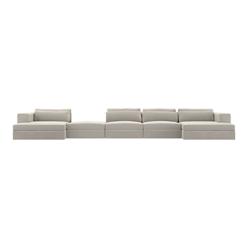 Modern modular sofa in soft beige with smooth fabric and minimalist design. Perfect for contemporary living spaces.