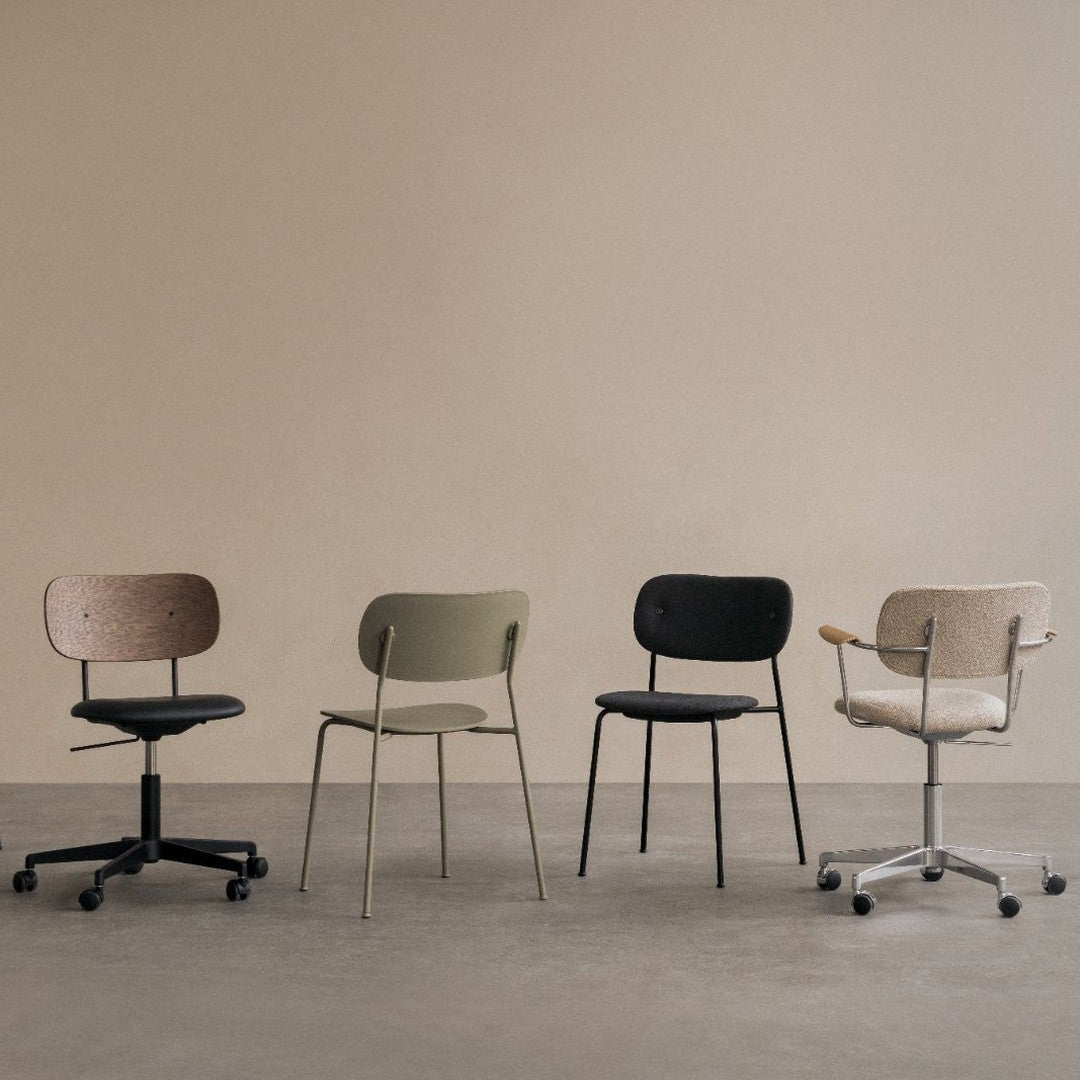 Four stylish office chairs in natural wood, olive green, black, and soft beige against a neutral backdrop.