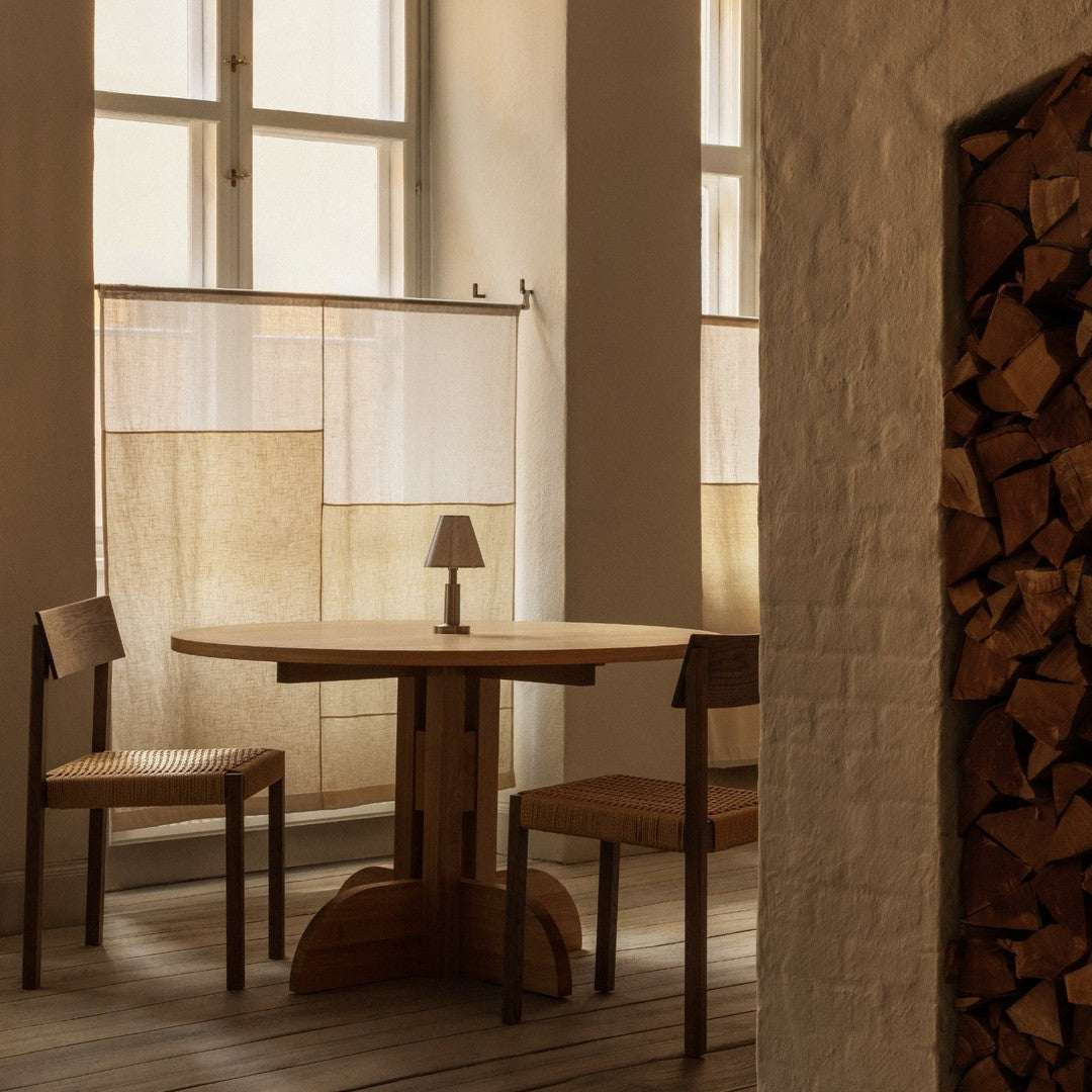Warm beige and soft cream hues with a subtle geometric pattern, perfect for creating a cozy dining space.