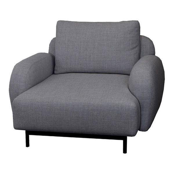 Gray upholstered armchair with a smooth texture and rounded armrests, set on a minimalist black metal frame.