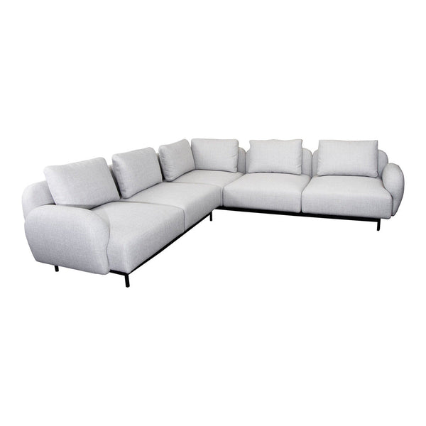 Stylish L-shaped sectional sofa in soft gray fabric with smooth lines and plush cushions, perfect for modern decor.