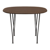 Brown oval tabletop with a wood grain pattern, supported by sleek black metal legs. Ideal for modern decor.