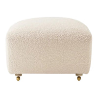 Beige textured ottoman with a soft, fluffy surface and gold-plated feet, perfect for modern decor.