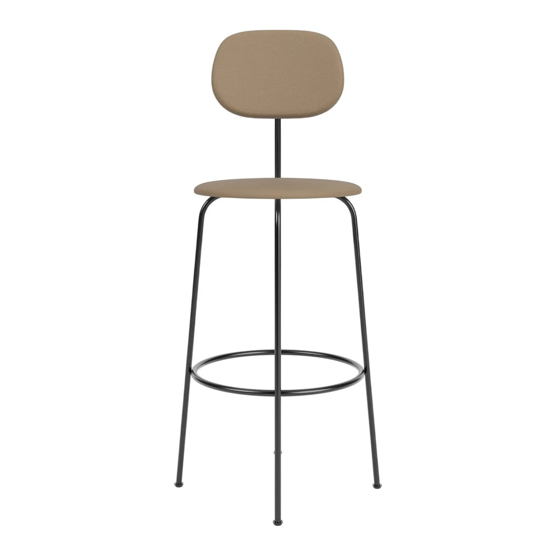 Tan upholstered bar stool with a minimalist design and sleek black metal legs. Perfect for modern interiors.