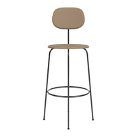 Tan upholstered bar stool with a minimalist design and sleek black metal legs. Perfect for modern interiors.