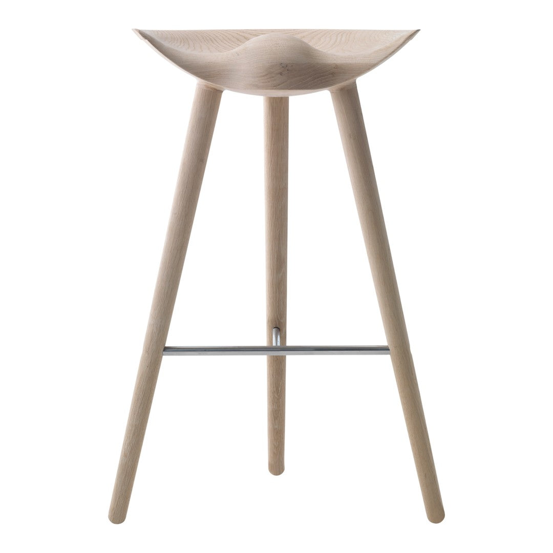 Natural wood bar stool with a smooth, curved seat and minimalist design featuring light tones and clean lines.