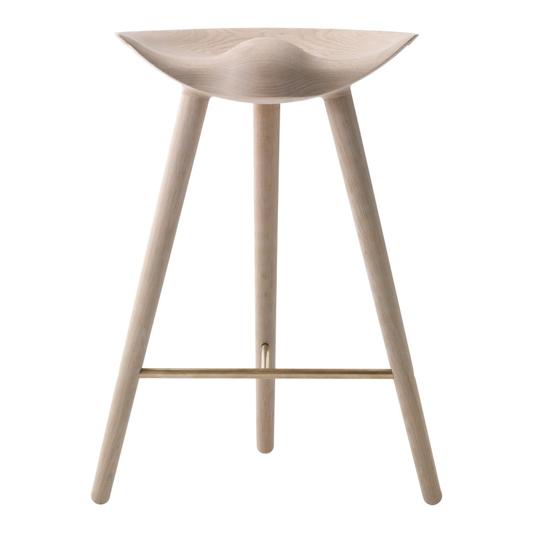 Lightwood bar stool with a smooth contoured seat and minimalist design, featuring natural wood grain and soft edges.