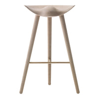 Light wood bar stool with a smooth curved seat and minimalist design, complemented by slender legs and a subtle gold accent.