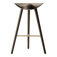 Dark wood bar stool with a smooth, curved seat and minimalist design, complemented by a sleek brass footrest.