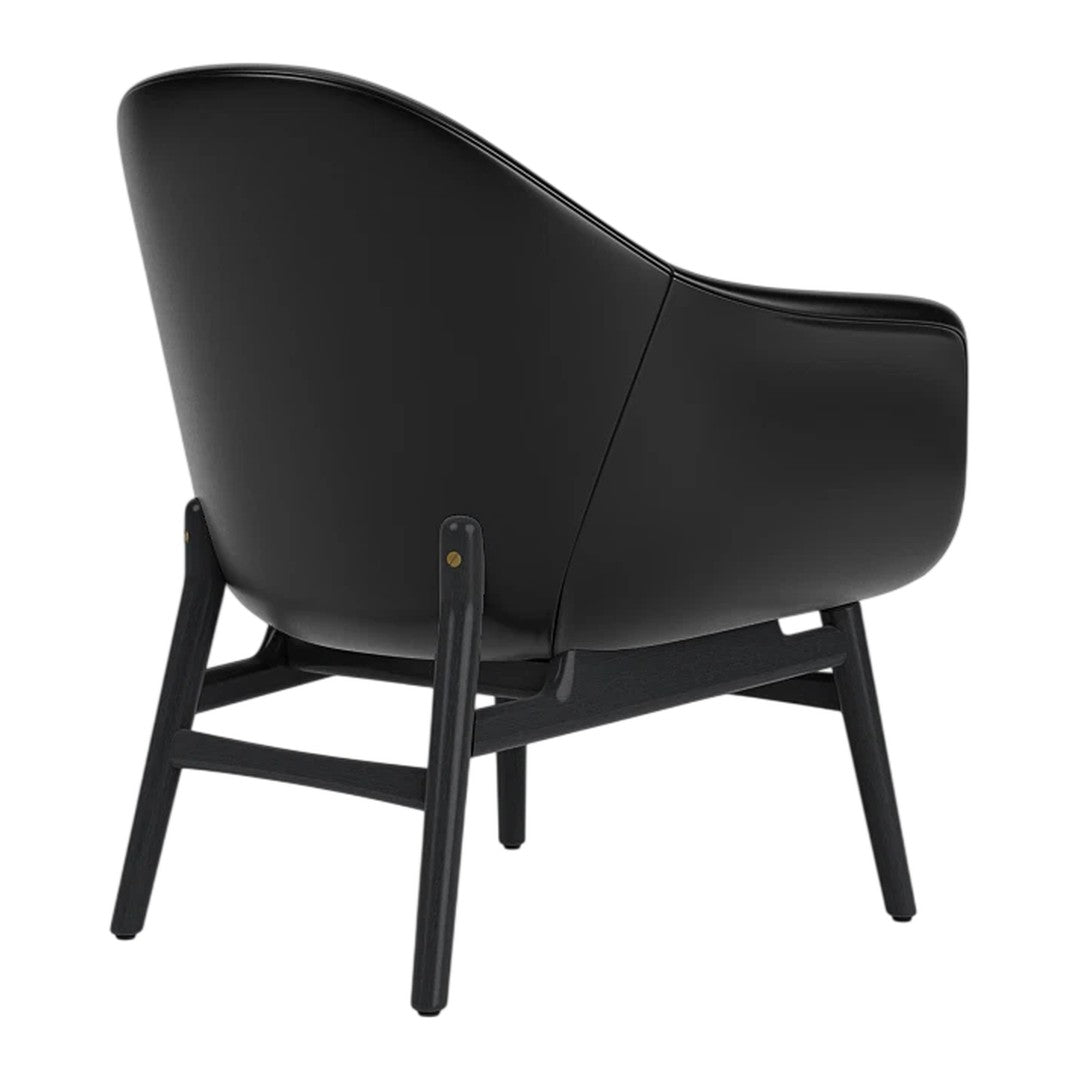 Black leather chair with a smooth, curved design and wooden legs in a matching black finish.