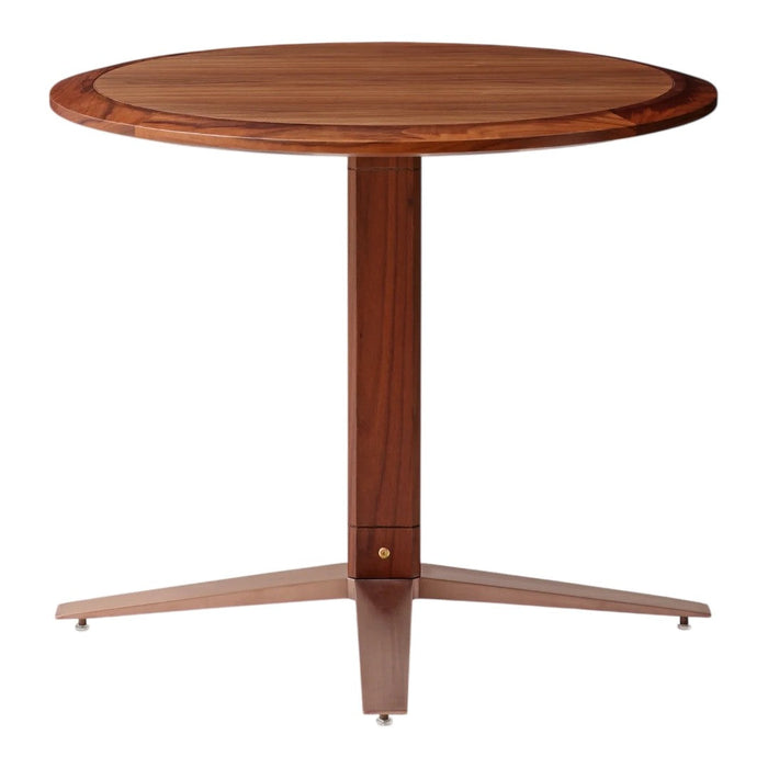 Round wooden table featuring a rich walnut finish and sleek metal legs, showcasing a modern, minimalistic design.