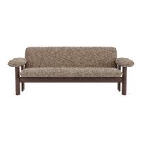 Textured brown fabric sofa with rounded armrests and dark wood frame, showcasing a cozy, neutral palette.