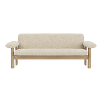 Beige-textured sofa with light wood arms, featuring a minimalist design and soft, neutral tones.