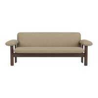 Beige upholstery with a smooth texture, complemented by dark wood armrests and a minimalist design.