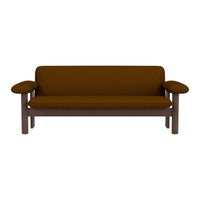 Brown upholstered sofa with sleek wooden arms, featuring a minimalist design and solid color.