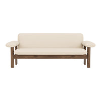 Cream upholstery sofa with a rich wood frame, featuring a minimalist design and smooth, clean lines. Perfect for modern decor.