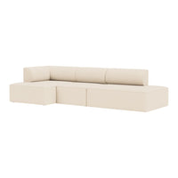 Beige modern sectional sofa with clean lines and a minimalist design, featuring solid neutral upholstery.