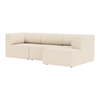 Beige corner sofa with a simple, modern design, featuring smooth, solid upholstery and clean lines.